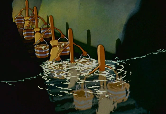 shot from the Fantasia short where brooms are holding buckets and descending into a flooded basement